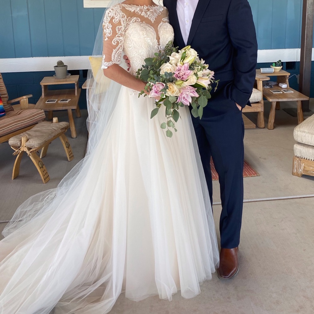 White, lace, low-back wedding gown